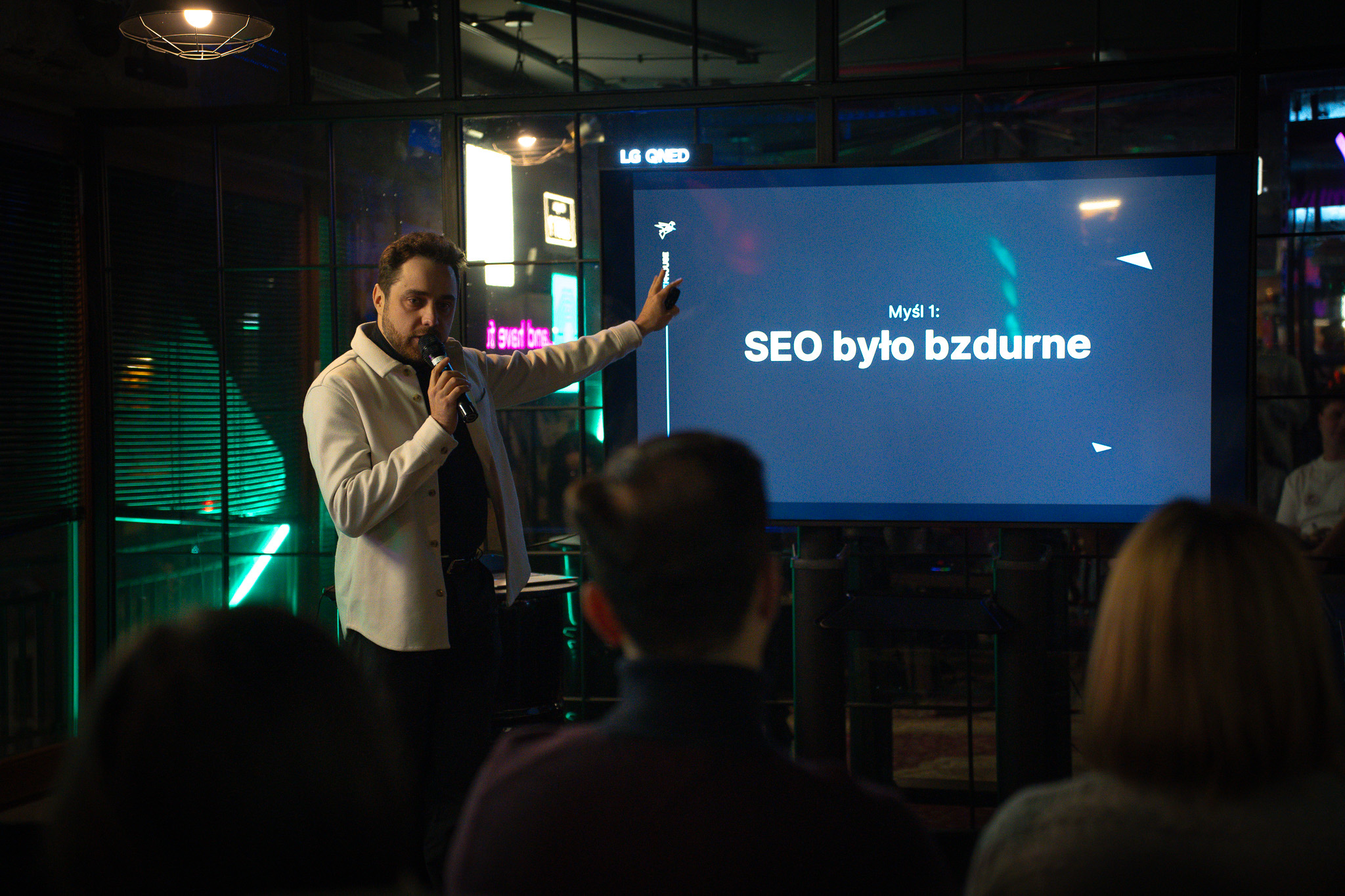 Rek House speaking at a marketing conference